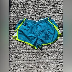 Like new Women's Under Armour Blue and Neon Green Lined Athletic Shorts